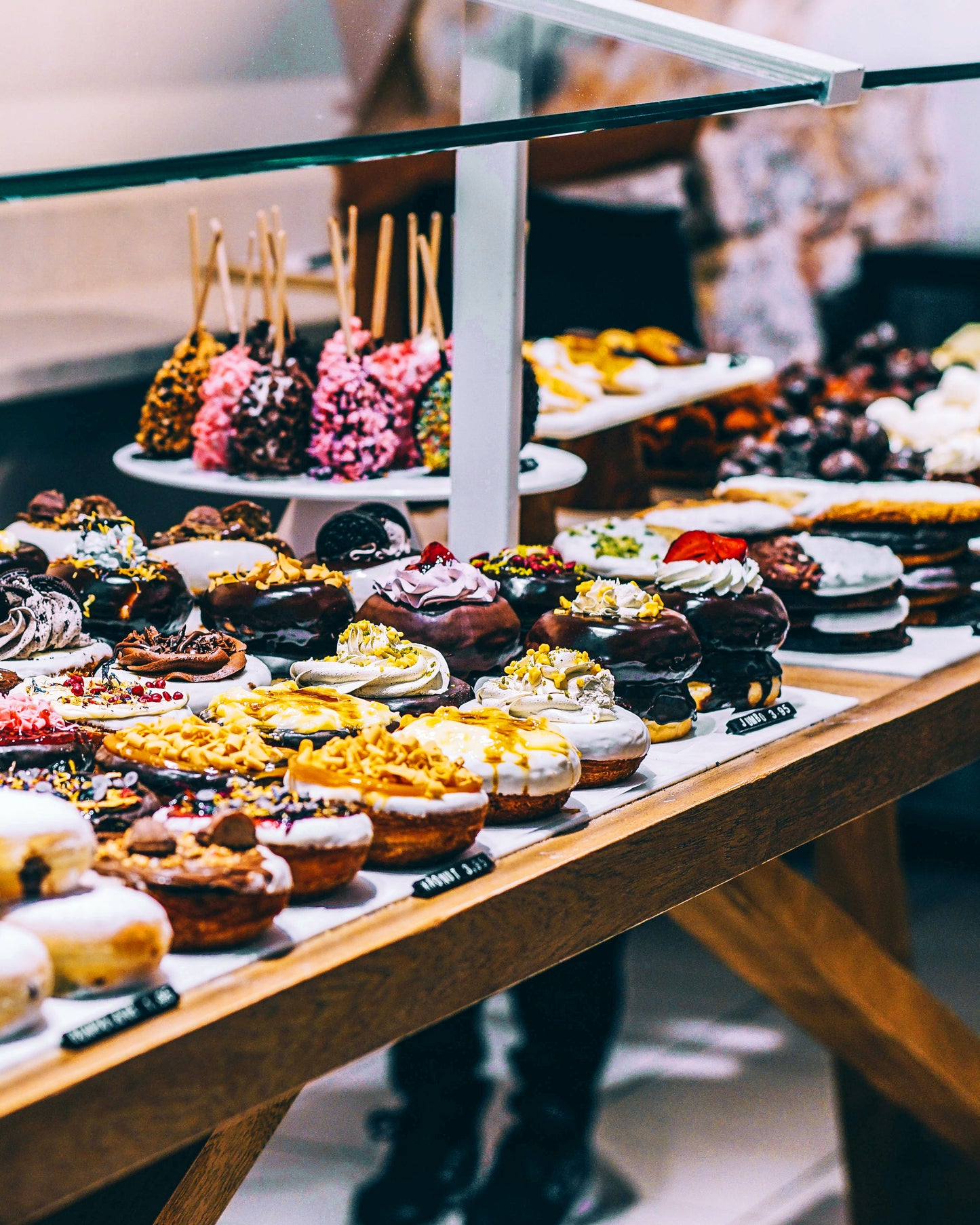 Rows of desserts on display for sale.
