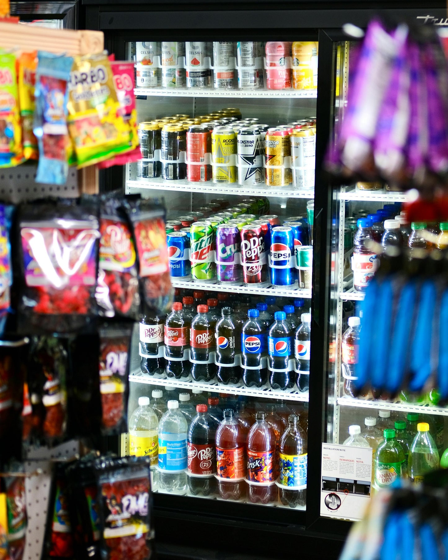 Drinks in a refrigerator in a convenience store.