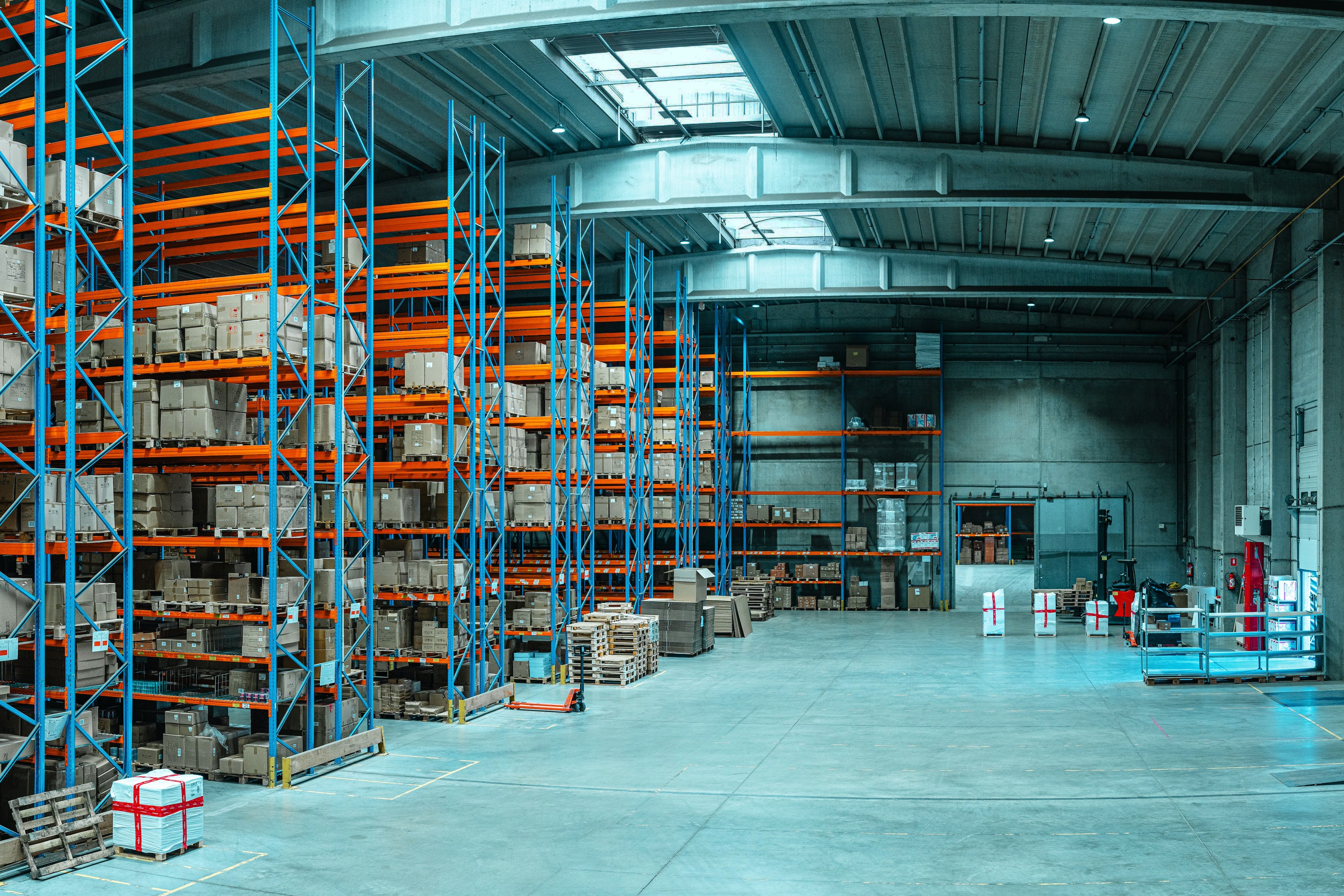 Distribution center with packages on racks.