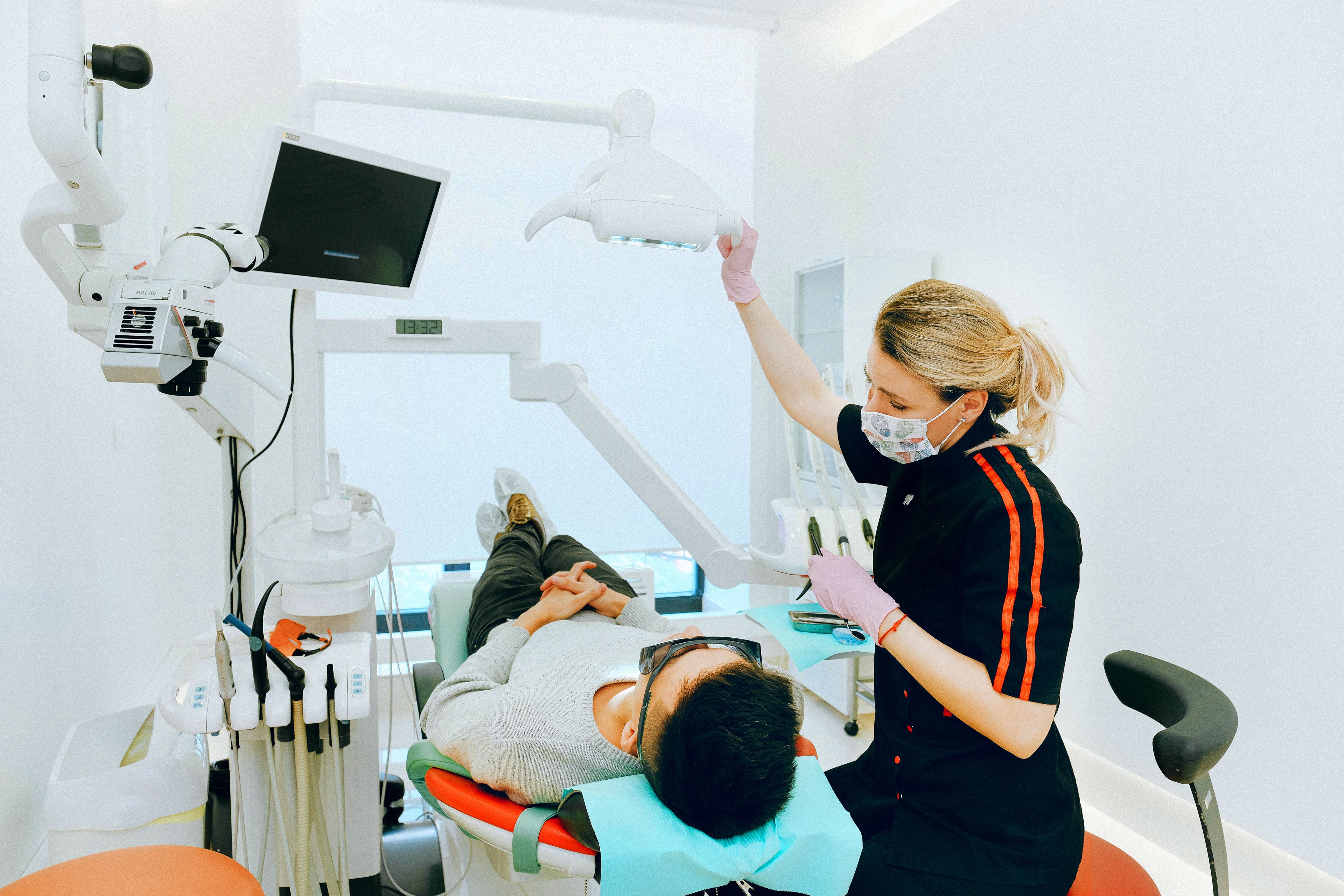 A dentist checking up on a patient.