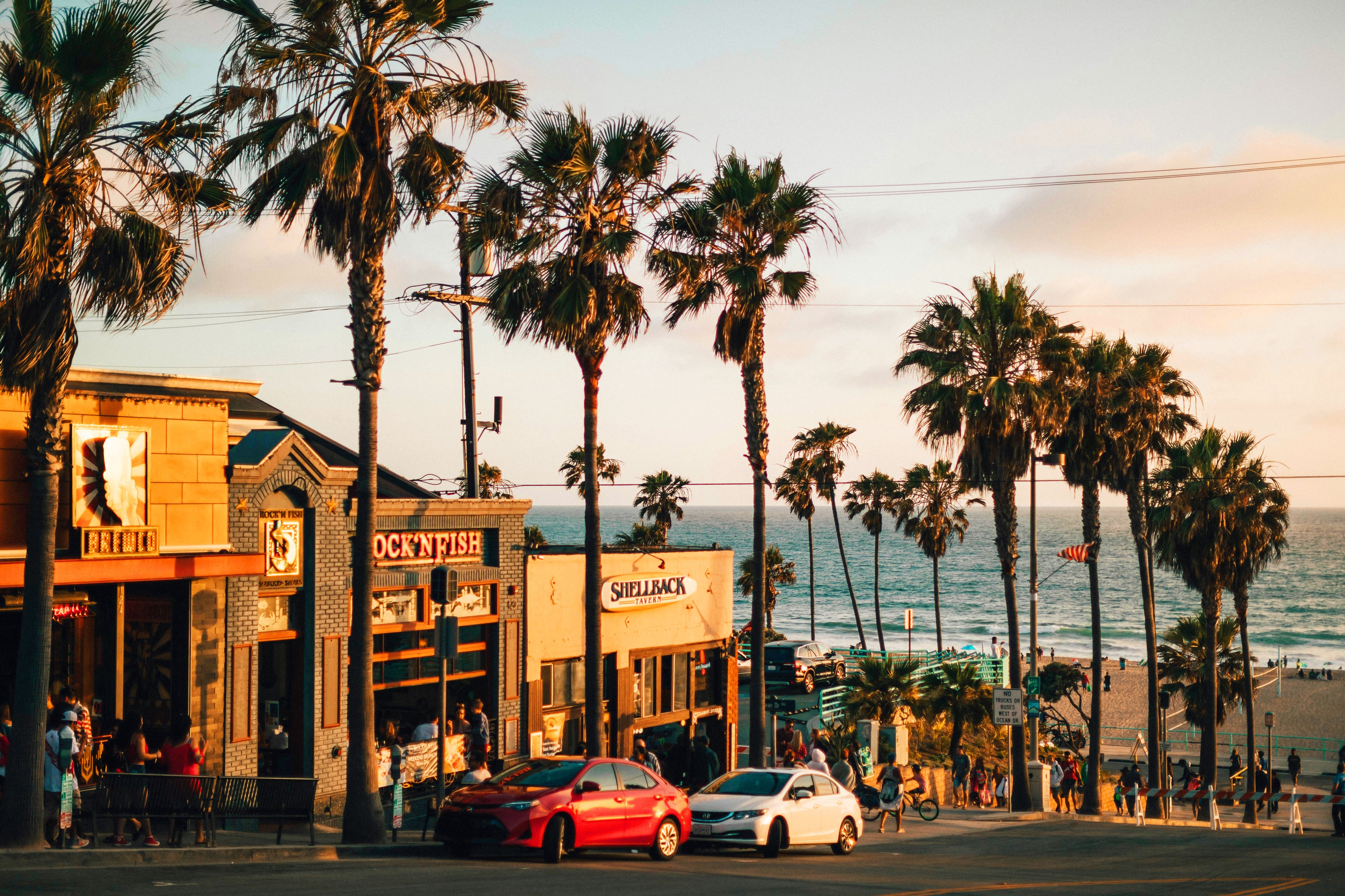 California beach restaurant businesses at sunset.