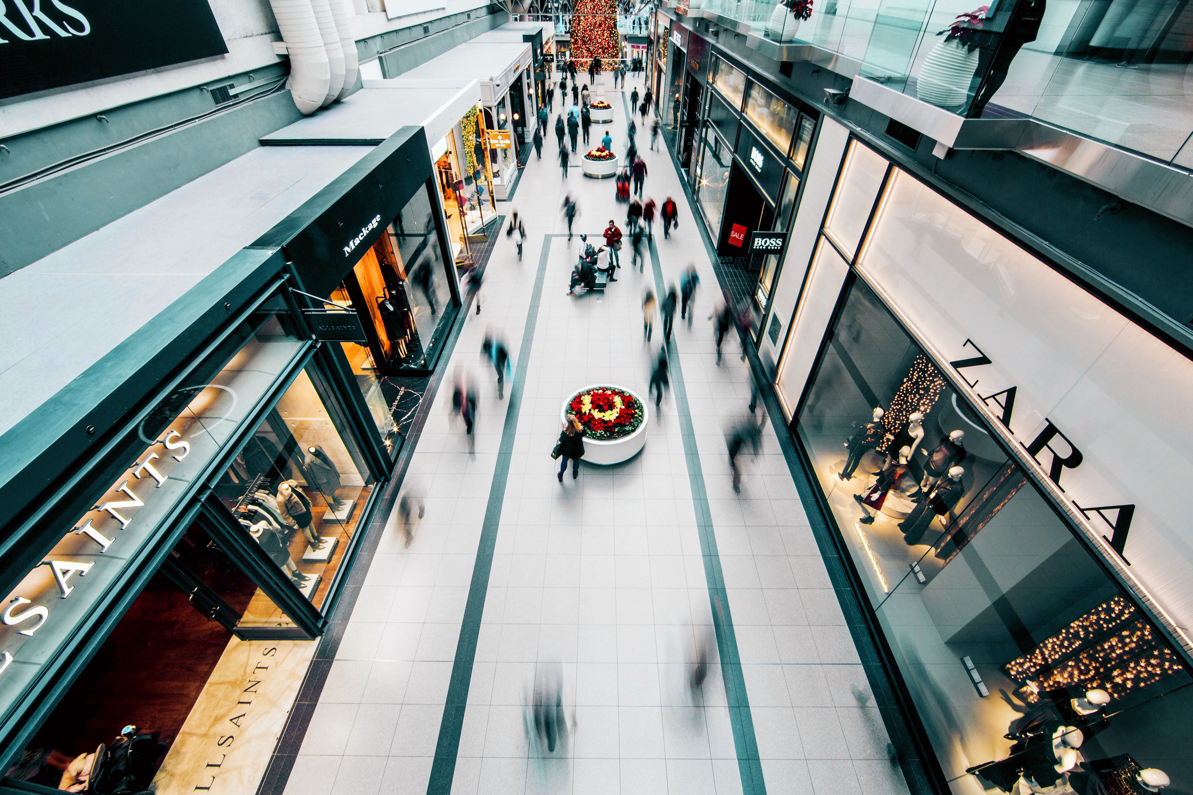 People walking through mall.