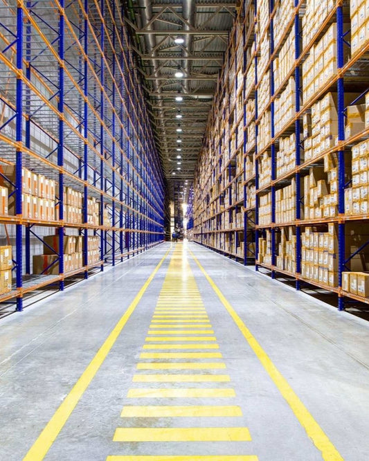 Rows of wholesale products in a warehouse.